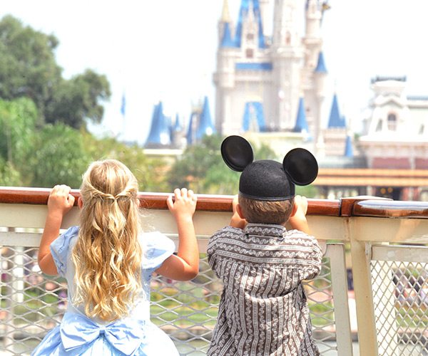 Kids looking at Disney Castle