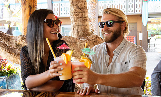 Couple enjoying drinks at cocoa beach Resort